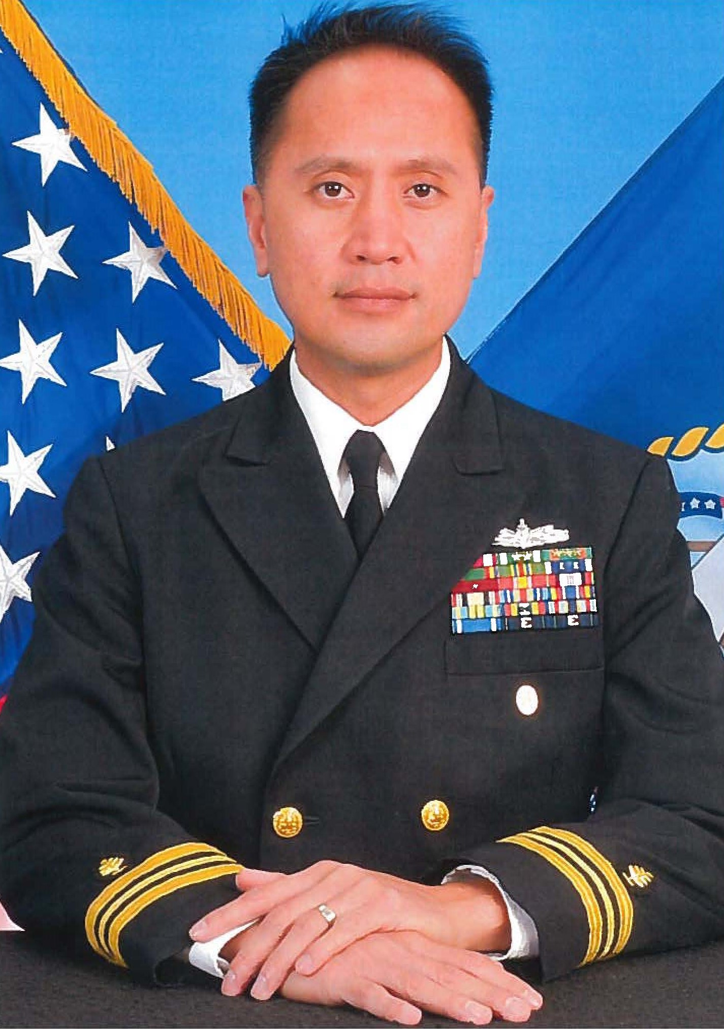 Command photo of LCDR Kristoffer Sol B. Reyes, USN